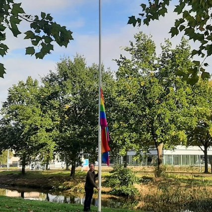 NWO hangs out rainbow flag during Coming Out day