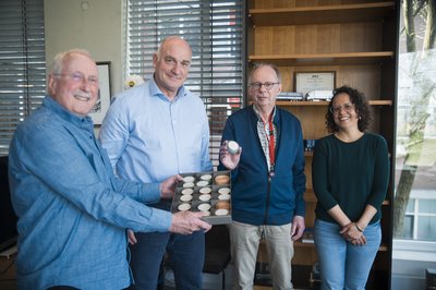 Punched tape project: CWI Fellow Paul Klint, then-CWI director Ton de Kok, Geert Rolf and Vera Sarkol (CWI Library), 10 April 2025. Picture: CWI/P. Roberts.