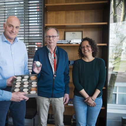 Punched tape project: CWI Fellow Paul Klint, CWI director Ton de Kok, Geert Rolf and Vera Sarkol (CWI Library), 10 April 2025. Picture: CWI/P. Roberts.