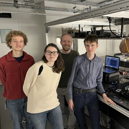 The research team posing in their lab.